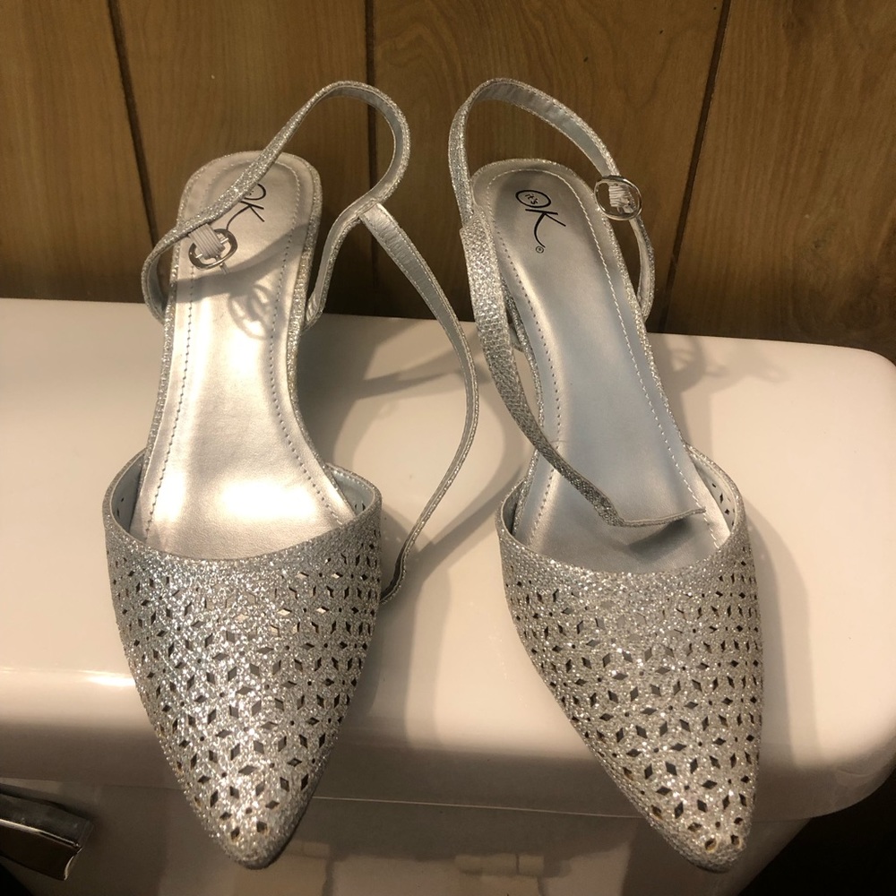Silver sparkling sling back shoe with buckle closure